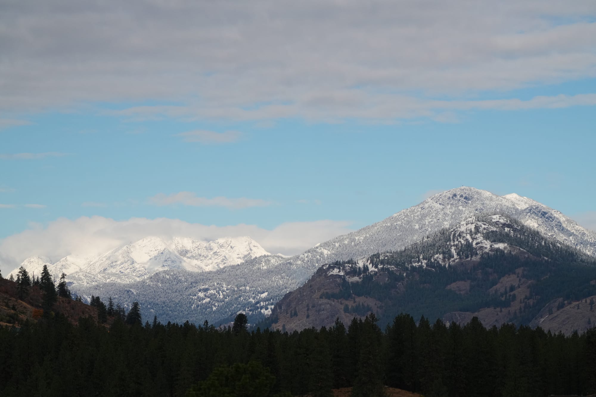 first snow on hills