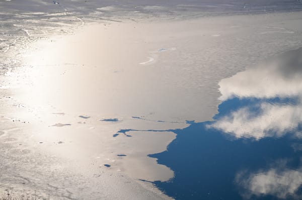 reflection on icy lake